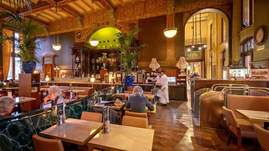 Amsterdam: Dutch Bitterballen and Croquette Tasting - The 1885 waiting-room setting, Pierre Cuypers, and the view of Old City Centre