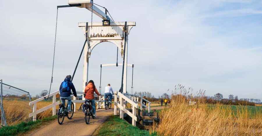 Amsterdam: Dutch Countryside E-Bike with Cheese & Clogs - Meeting up near Nemo and the OBA, then crossing the IJ