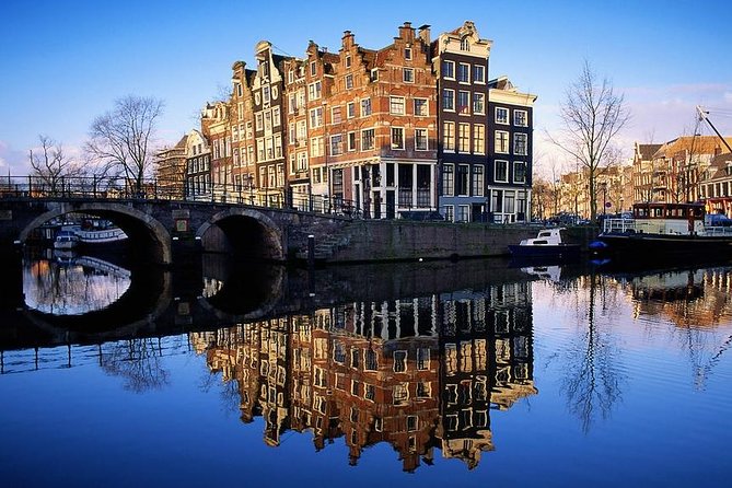 Amsterdam: E-Bike Sightseeing Tour - Getting Back to the Shop and Resetting With a Drink
