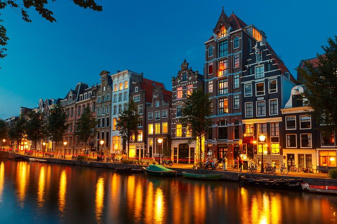 Amsterdam Evening Canal Cruise with Live Guide and Onboard Bar - Guide Style, Onboard Drinks, and How the Cruise Feels in Real Life