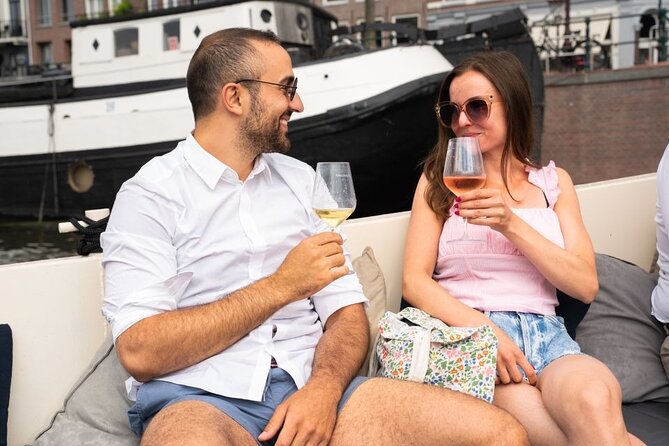 Amsterdam: Evening Candle Light Cruise With Wine & Cheese - Waterlooplein, Jewish Market History, and the Stopera Complex
