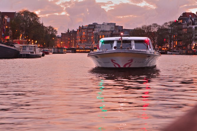 Amsterdam Evening Cocktail Cruise with snacks - Centraal Station After Dark: A Clean First Landmark