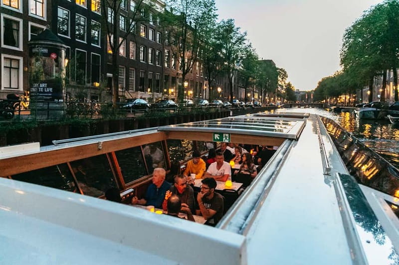 Amsterdam: Evening Cruise with Optional Wine and Snacks - Bridges to watch for: Skinny Bridge, Magere Brug, and Blauwbrug