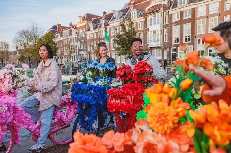 Amsterdam: Explore Canals, Guided Tour on Flower Bikes - Price and logistics, the real decision points