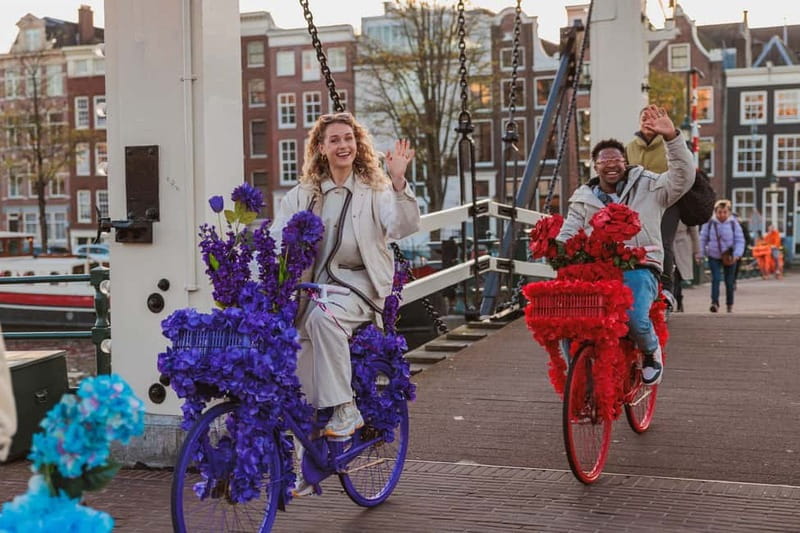 Amsterdam: Explore Canals, Guided Tour on Flower Bikes - Guides, humor, and Q&A time that actually helps