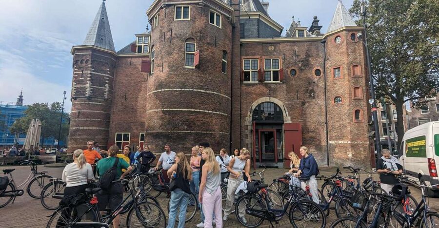Amsterdam: Explore the City Highlights by Bike - Canal Belt Riding: Leaning Houses and Bridge Logic