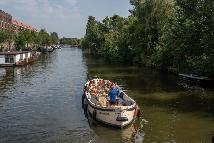 Amsterdam: German Guided Canal Cruise with on Board Bar - Should you book this Amsterdam German canal cruise?