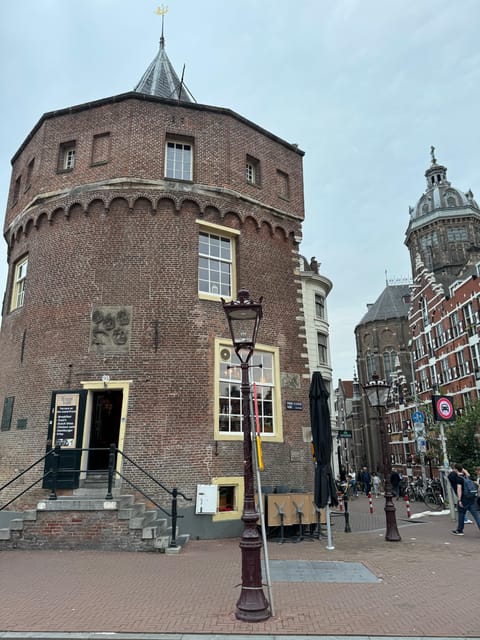 Amsterdam: Ghost Walking Tour and Dark History - Dam Square to the Nieuwe Kerk start, where the tour finds its footing