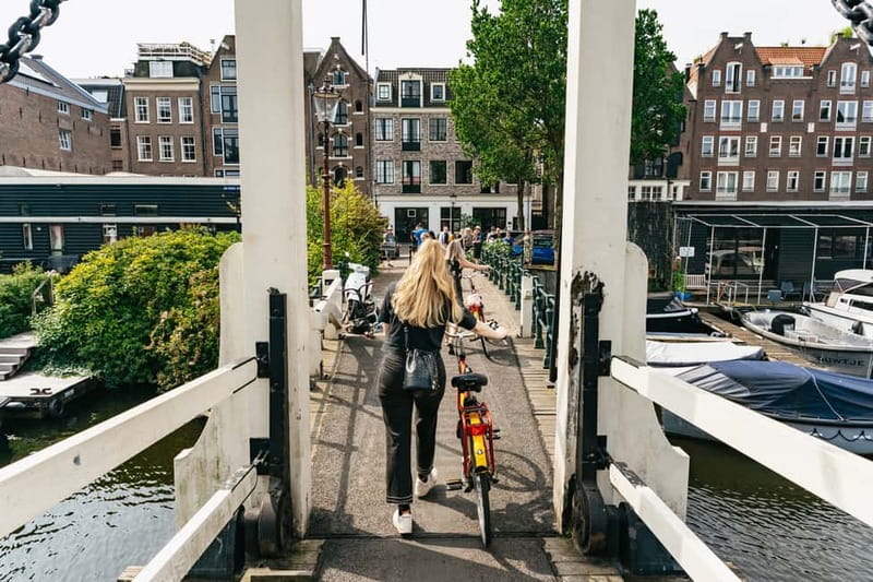 Amsterdam: Guided Bike Tour City Centre in EN/DE/FR/ES - Why a 3-hour guided bike route is the best way to see Amsterdam fast