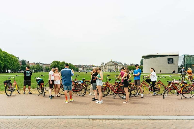 Amsterdam: Guided Bike Tour City Centre in EN/DE/FR/ES - Central canals to A’DAM Tower, then the Western Islands with real bridge drama