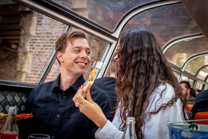 Amsterdam Guided Cruise with New York Pizza, Drinks and Ice Cream - A 75-Minute Canal Cruise That Feels Like Dinner, Not a Detour