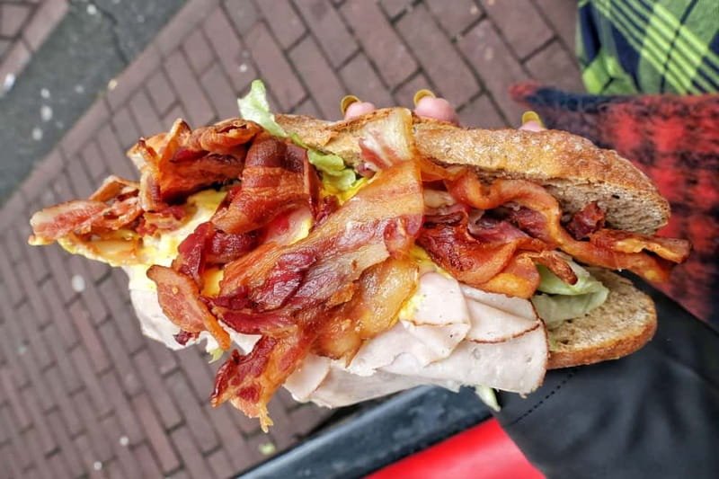Amsterdam: Guided Food Tour with Tastings - Walking Days vs Bike Days in Amsterdam Center