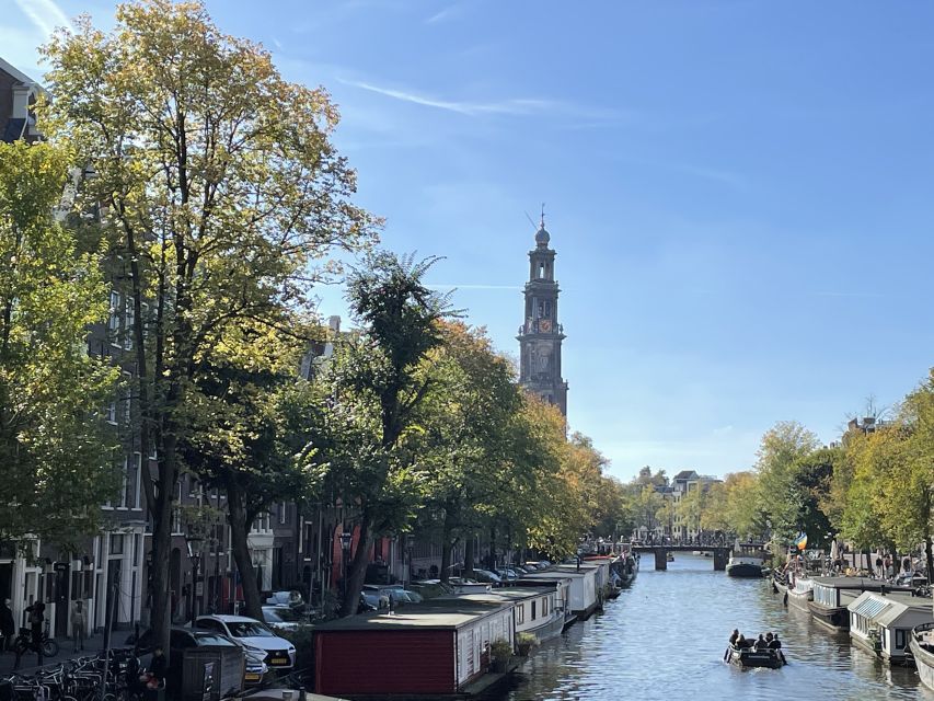 Amsterdam: Guided Off-The-Beaten-Track Walking Tour - Westerdoks and the Western Islands: modern lines, old water