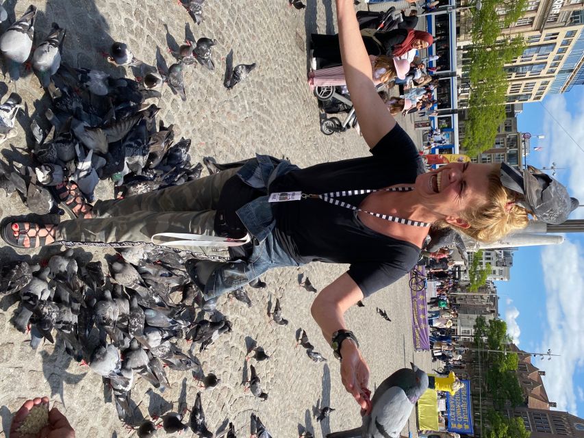 Amsterdam: Guided Off-The-Beaten-Track Walking Tour - Dam Square to Torensluis: the canal belt story in plain terms