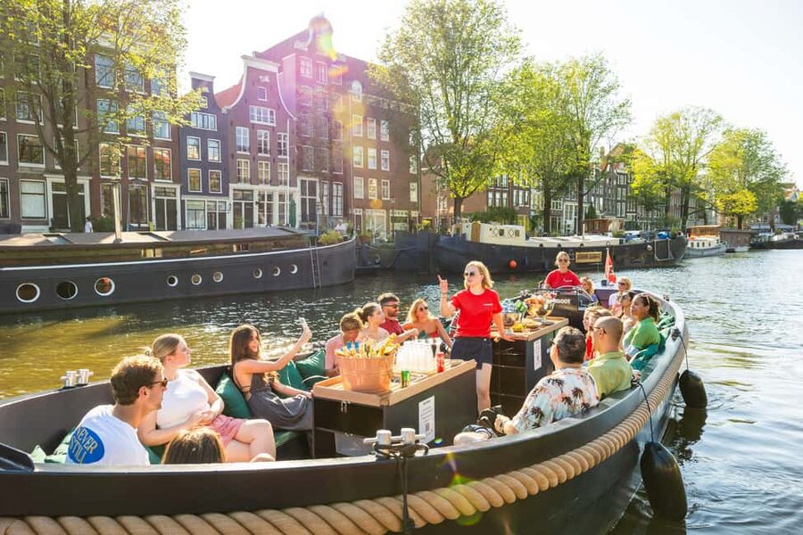 Amsterdam: Guided Open Boat Canal Cruise Including Drink - Key Points Before You Go