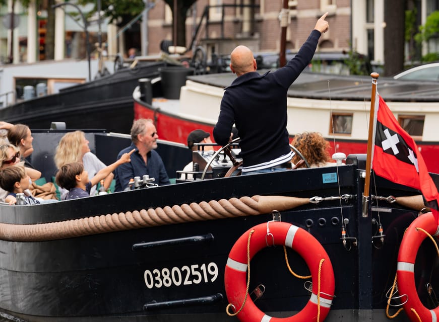 Amsterdam: Guided Open Boat Canal Cruise Including Drink - Should You Book This Open-Boat Canal Cruise?