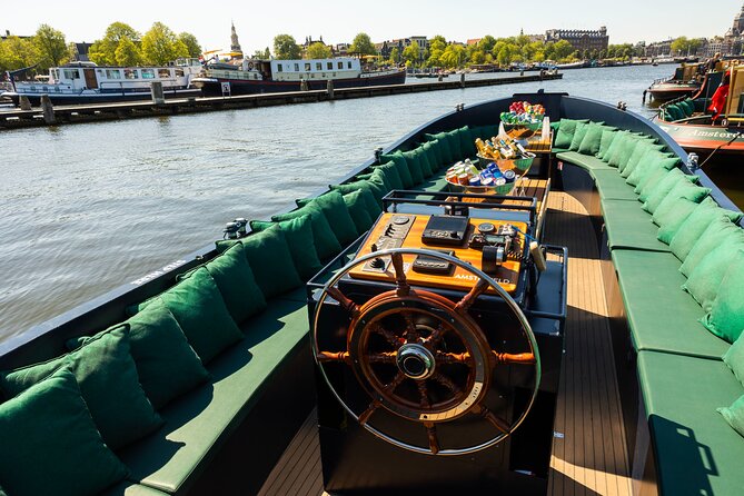 Amsterdam: Guided Open Boat Canal Cruise Unlimited Drinks Option - Key things to know