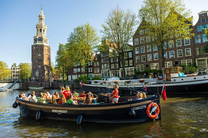 Amsterdam: Guided Open Boat Canal Cruise Unlimited Drinks Option - Open Boat Canal Views From Stationsplein to the Canal Belt