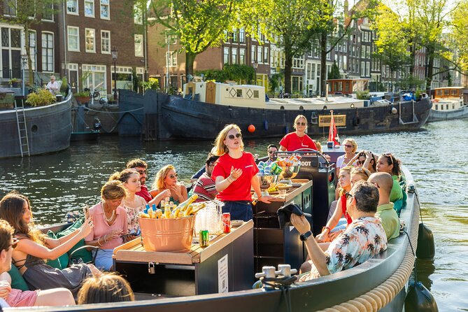 Amsterdam: Guided Open Boat Canal Cruise Unlimited Drinks Option - The Route in One Hour: How the Stops Help You Understand Amsterdam