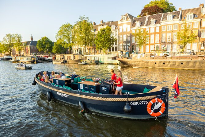 Amsterdam: Guided Open Boat Canal Cruise Unlimited Drinks Option - NEMO and Science on the Water: A Break From Pure Nostalgia