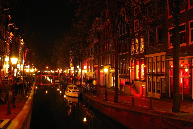 Amsterdam: Guided Red Light District and City Walking Tour - Pub The Ape (Int Aepjen): One of the Last Old Wooden Buildings