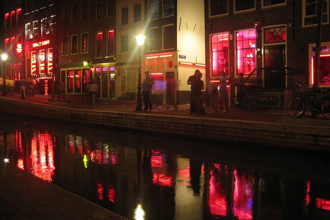 Amsterdam: Guided Red Light District and City Walking Tour - Condomerie: A Modern Counterpoint in Old Town