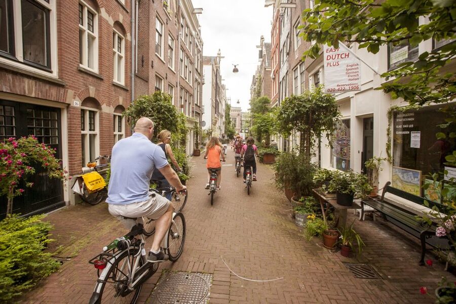 Amsterdam: Hidden Gems & Highlights Guided Bike Tour - Museumplein at the end: orienting yourself to the big museum cluster