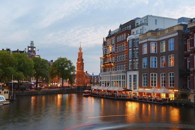 Amsterdam Highlights Canal Cruise with a Drink - Entering Amsterdam from the water, not the sidewalk