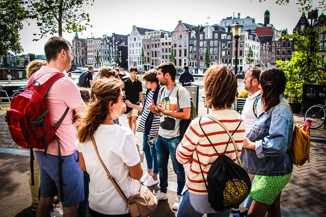 Amsterdam Highlights Small-Group Walking Tour - Centraal Station stop: architecture plus a reality check on travel