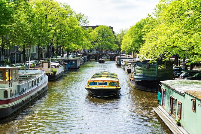 Amsterdam: Historic City Sightseeing Canal Cruise - The Early Stops That Set the Scene: Canals, Westerkerk, and a Houseboat Museum