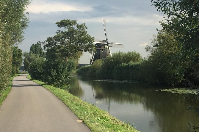 Amsterdam in a Nutshell 4 Hour Private Car Tour and Amsterdam Born Private Guide - Hotel or airport pickup, then staying on time