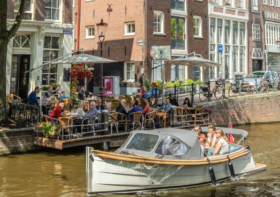Amsterdam: Jordaan District Tour with a German guide - The Secret Garden Stop and Tulip Mania: Money History in a Quiet Place
