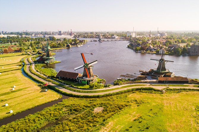 Amsterdam: Keukenhof, Zaanse Schans & Volendam Tour - Zaanse Schans windmills, shipyard sights, and clog-making craft
