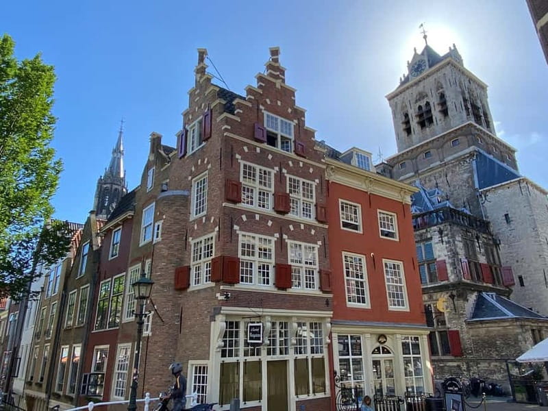 Amsterdam: Kinderdijk, Euromast, Delft and Den Haag Day Tour - Why this Amsterdam to South Holland route feels efficient