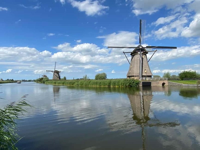 Amsterdam: Kinderdijk, Euromast, Delft and Den Haag Day Tour - Kinderdijk UNESCO Windmills: 19 original towers, real Dutch engineering