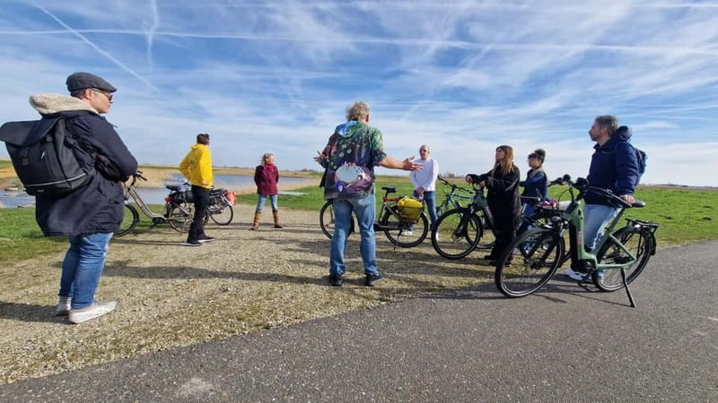Amsterdam: Leisurely Windmill & Countryside Bike Ride - Getting Started at Oosterdoks Island and the IJ Ferry