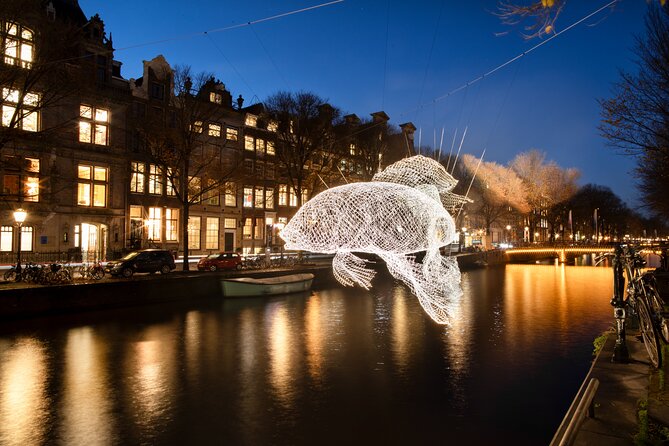 Amsterdam Light Festival Canal Cruise + Unlimited Drinks Option - Meeting at KINboat near Central Station, and why it helps