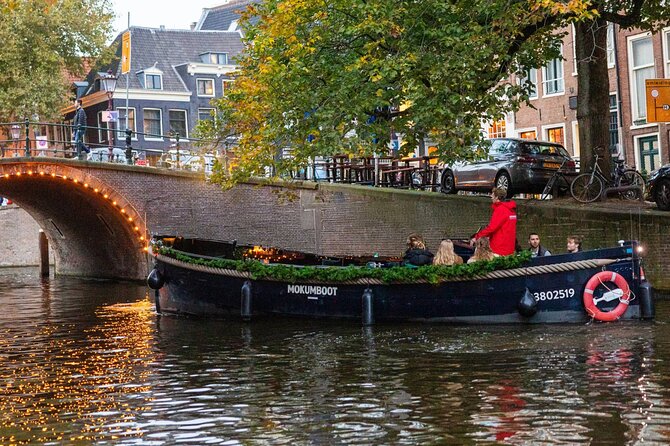 Amsterdam: Light Festival Open Boat - Unl. Drinks Option - Stop by stop: what you will actually see and why it matters
