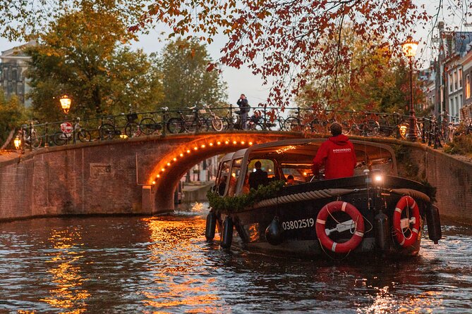 Amsterdam: Light Festival Open Boat - Unl. Drinks Option - Drinks, snacks, and what to do with the optional vibe