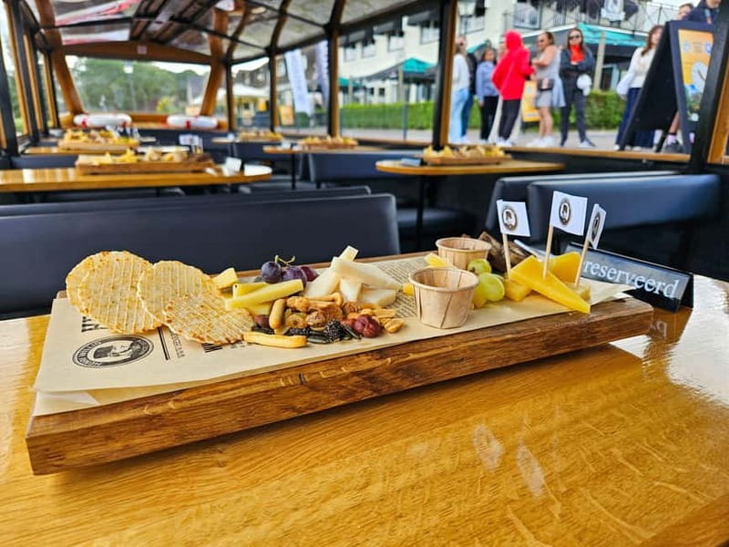 Amsterdam: Live GuideD Giethoorn Boat Tour & Cheese Platter - Key highlights worth showing up for