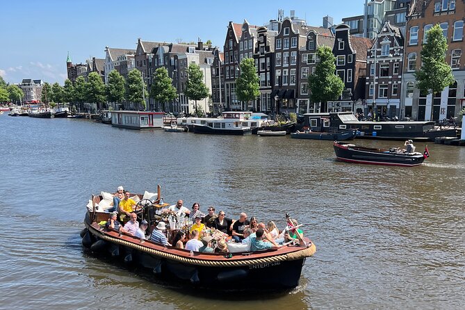 Amsterdam Luxury Boutique Boat tour with Unlimited Beer and Wine - A 40 to 45 Minute Canal Ride That Lets You See Amsterdam Fast
