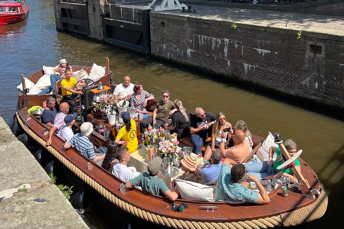 Amsterdam Luxury Boutique Boat tour with Unlimited Beer and Wine - Magera Brug and the Skinny Bridge: Why That Name Makes Sense