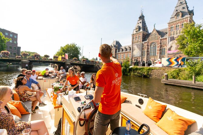 Amsterdam Luxury Canal Cruise + Unlimited Drinks & Bites option - Leidseplein, Bloemenmarkt, and Magere Brug: Amsterdam Gets Playful