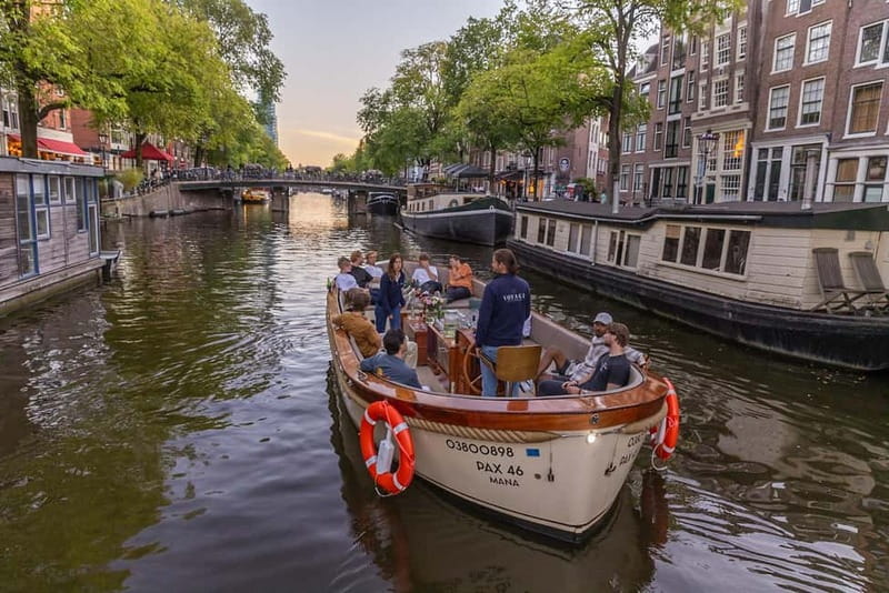 Amsterdam: Luxury Canal Cruise with Optional Snacks & Drinks - Cheese Museum, Seven Province Houses, and the houseboat alley