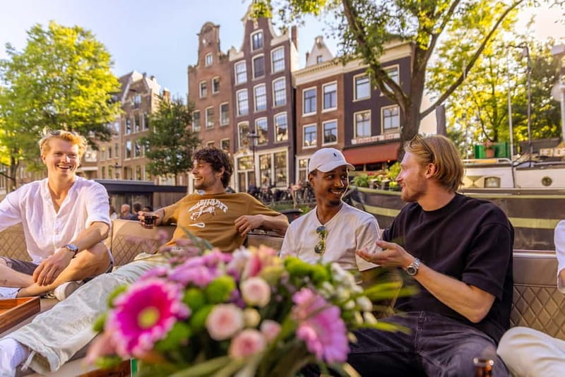 Amsterdam: Luxury Canal Cruise with Optional Snacks & Drinks - Oosterdock and Sea Palace, waterfront highlights that feel slightly less touristy