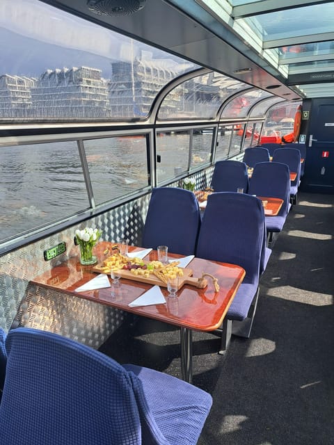 Amsterdam: Luxury Cheese & Wine Canal Cruise - Cheese and canal views in one hour, and why it works