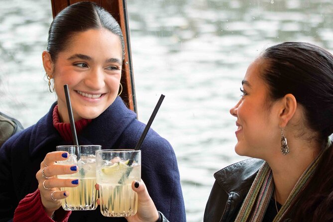Amsterdam: Luxury Saloon Boat Cruise with Cocktails & Waffle - Bridges, locks, and the engineering side of canal Amsterdam
