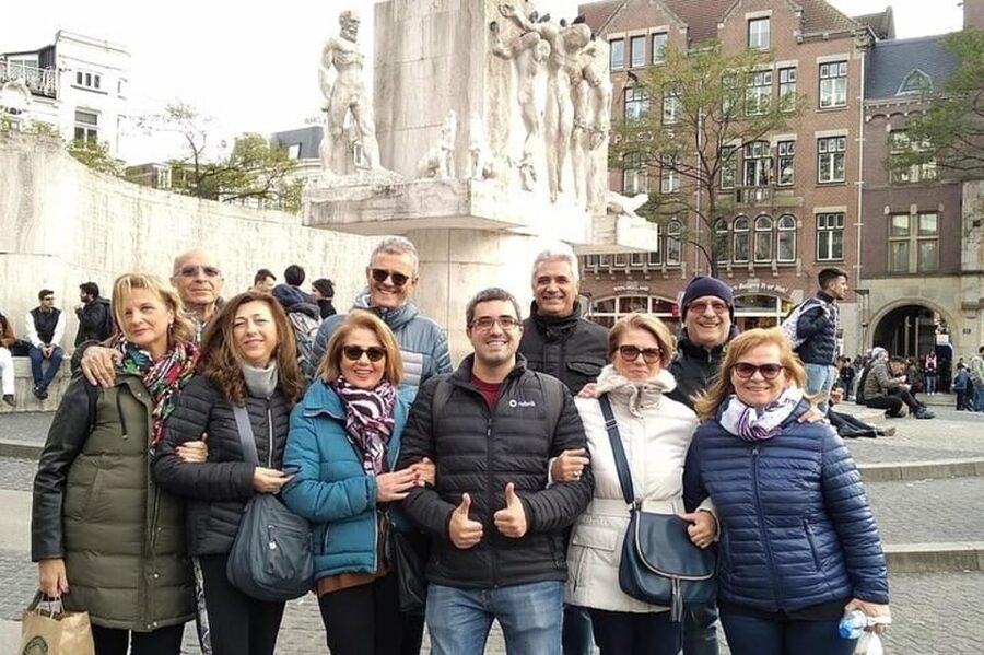 Amsterdam: Must-See Attractions Guided Walking Tour - Dam Square and the Royal Palace, plus Dutch East Indies context