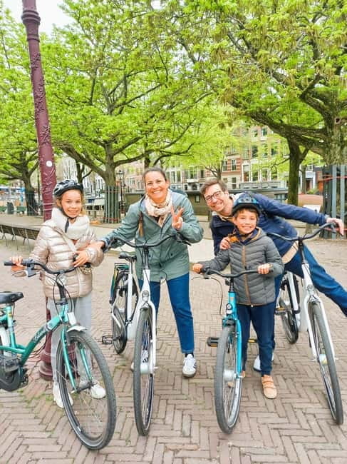 Amsterdam: Off the Beaten Path Bike Tour in French - Magere Brug and Amstelveld: the classic postcard moments, placed thoughtfully