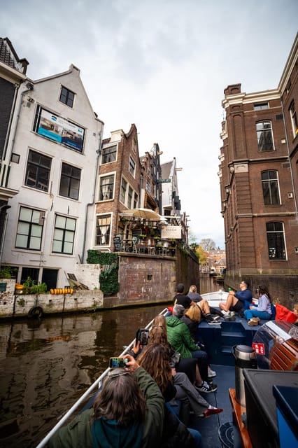 Amsterdam:Old City Canal Cruise with Live Guide and Open Bar - Price and Value: Is $31 Worth It in Amsterdam?